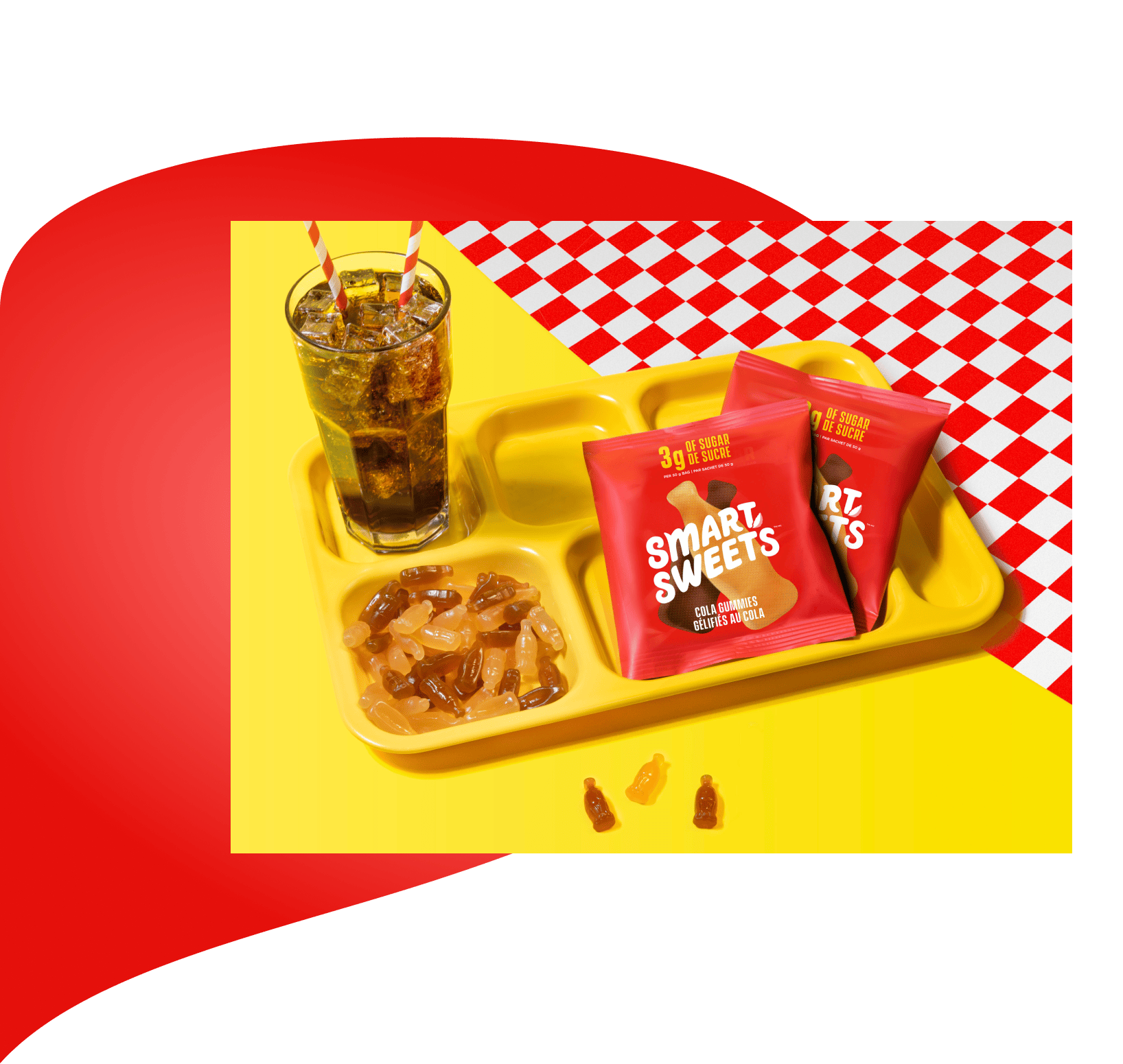 Cola Gummies pouches in yellow lunch tray