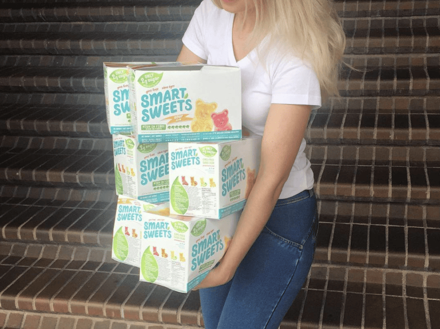 Holding original boxes of SmartSweets
