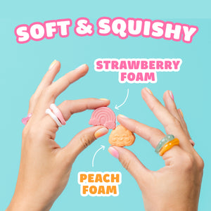 Hands holding candy. Text: Soft & Squishy, Strawberry Foam, Peach Foam.